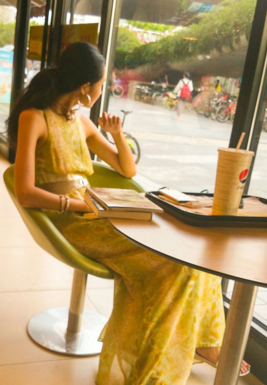 indoors, window, glass - material, transparent, table, food and drink, sitting, chair, day, restaurant, sunlight, railing, close-up, cropped, part of, vehicle interior, lifestyles, preparation