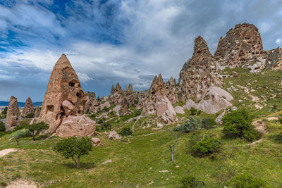 Uchisar castle in cappadocia, carved out of rock formations. turkey.