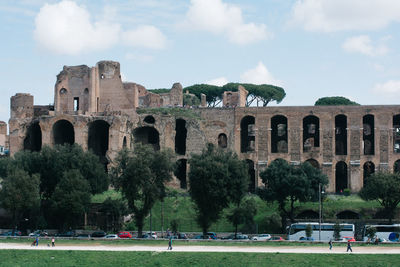 Group of people in front of historical building