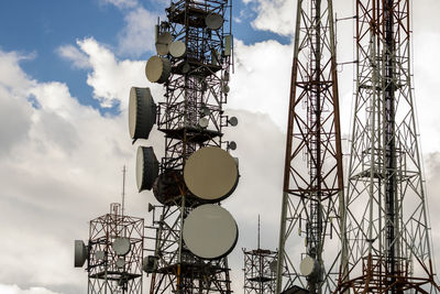 Telecommunication mast tv antennas wireless technology with cloudy blue sky in brazil