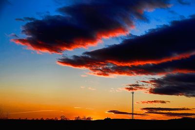 Low angle view of dramatic sky during sunset