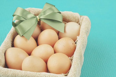 High angle view of eggs against white background