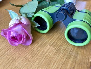 Close-up of pink roses on table