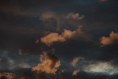 Low angle view of clouds in sky during sunset