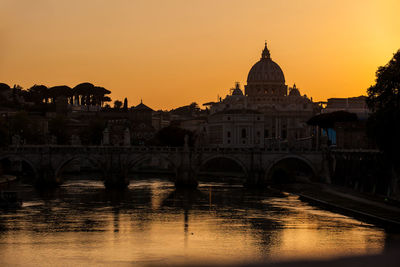 The sunset falls over the beautiful constantinian basilica of st. peter at the vatican city