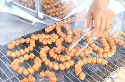 Close-up of meat on barbecue grill