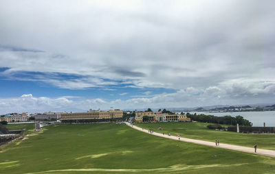 Scenic view of soccer field against sky