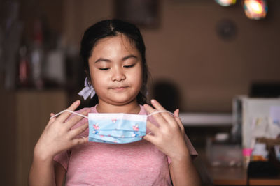 Portrait of a girl holding ice cream