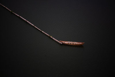 High angle view of leather over black background