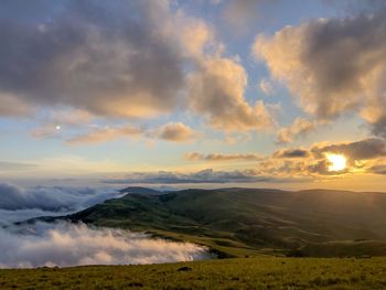 Scenic view of landscape against sky during sunset