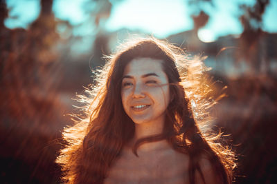 Portrait of smiling young woman