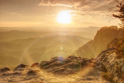 Panoramic view of mountains against sky during sunset