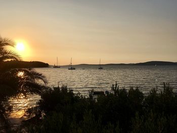 Scenic view of sea against sky during sunset