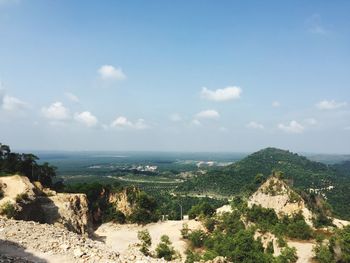 Scenic view of sea and landscape against sky