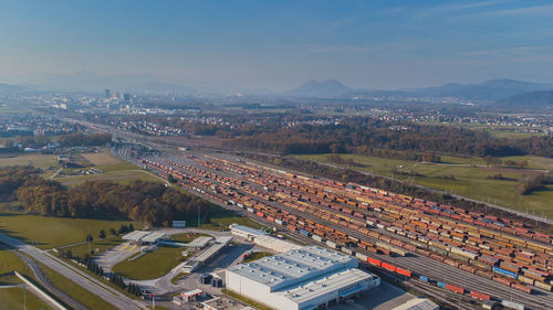 High angle view of buildings in city against sky