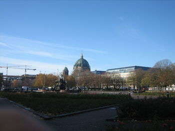 View of fountain building against sky