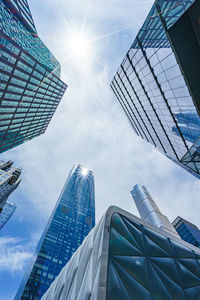 Low angle view of modern buildings against sky