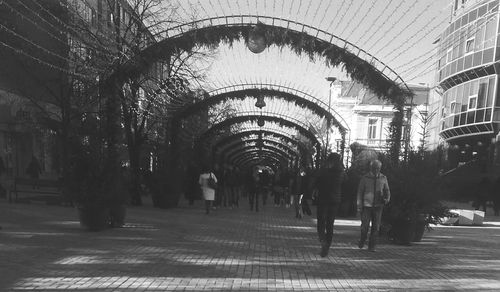 View of illuminated people in shopping mall