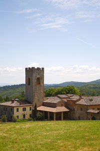 Old building on field against sky