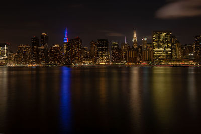 Illuminated buildings in city at night