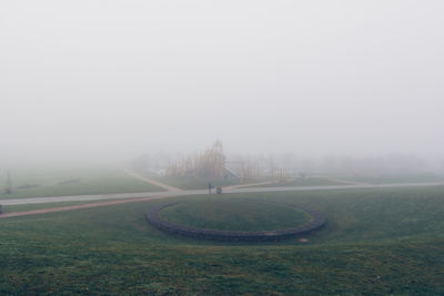 Scenic view of park in foggy weather