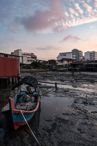 Sunrise view of wooden boat background at clan tan jetty, penang, malaysia.