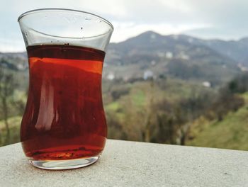 Close-up of drink against sky