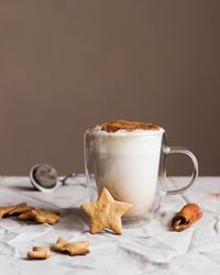 Close-up of coffee cup on table