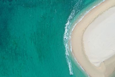 High angle view of surf on beach