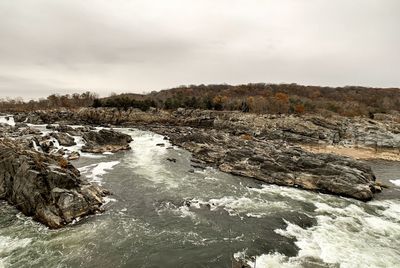 Scenic view of river against sky