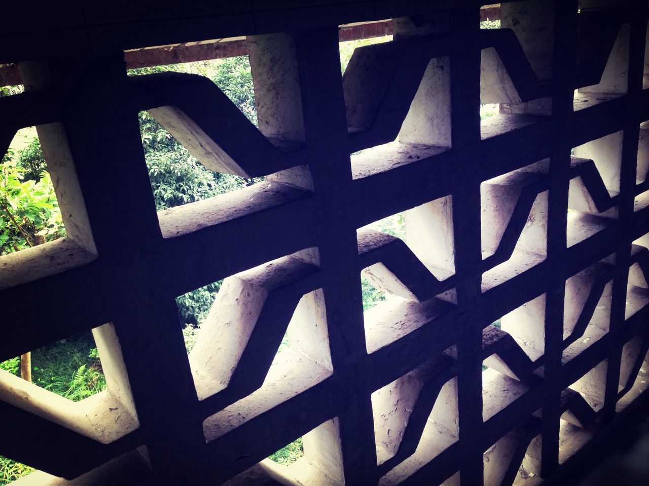 indoors, metal, railing, built structure, pattern, window, sunlight, architecture, metallic, close-up, day, no people, shadow, glass - material, transparent, design, full frame, geometric shape, high angle view, wood - material