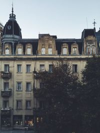 Buildings against clear sky