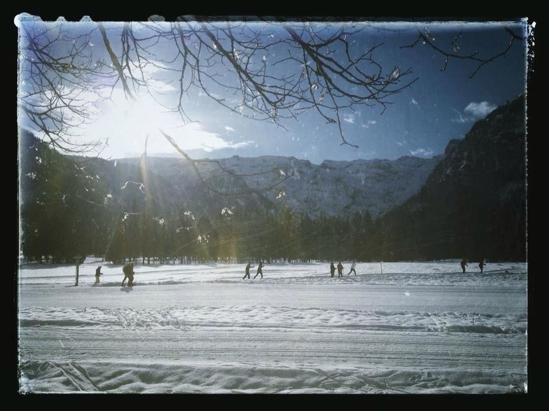 snow, transfer print, winter, mountain, cold temperature, auto post production filter, tree, season, landscape, scenics, tranquil scene, tranquility, beauty in nature, nature, weather, sky, mountain range, sunlight, bare tree