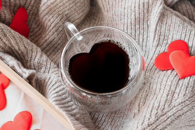 High angle view of red heart shape on table