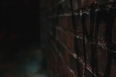 Close-up of old stone wall in building