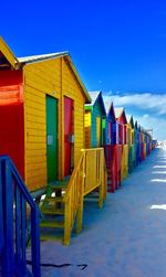 Colorful built structure against blue sky