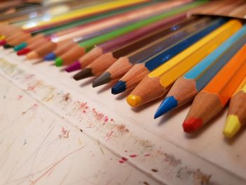 High angle view of colored pencils on table