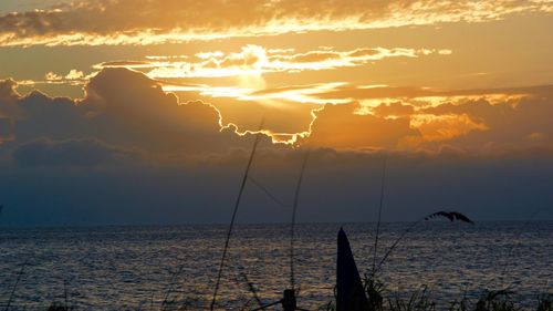 Scenic view of sea at sunset