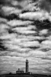 Building against cloudy sky