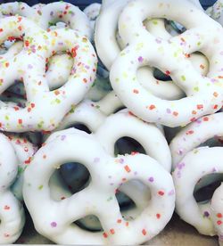 Close-up of chocolate pretzels with colorful sprinkles