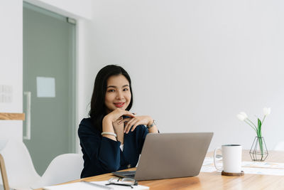 Businesswoman working at office