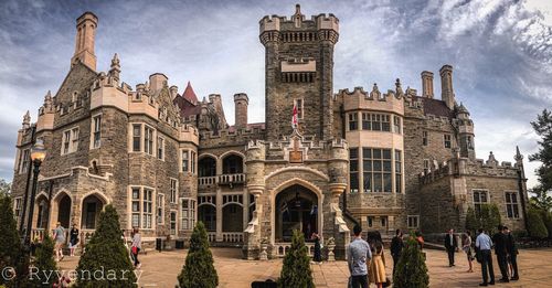 Group of people in front of historic building