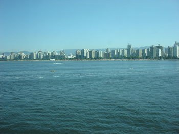 View of cityscape against clear sky