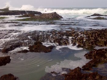 View of waves breaking on beach