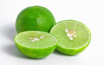 Close-up of lemon against white background