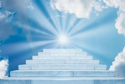 Stack of stone wall against sky