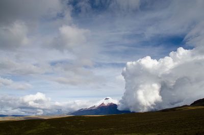 Scenic view of cotopaxi against sky