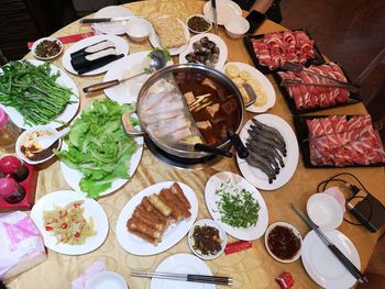 High angle view of meal served on table