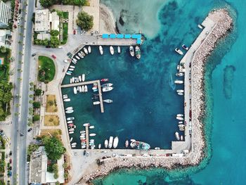 High angle view of people on small harbor 