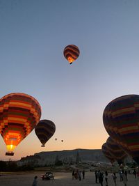 Low angle view of hot air balloons in sky